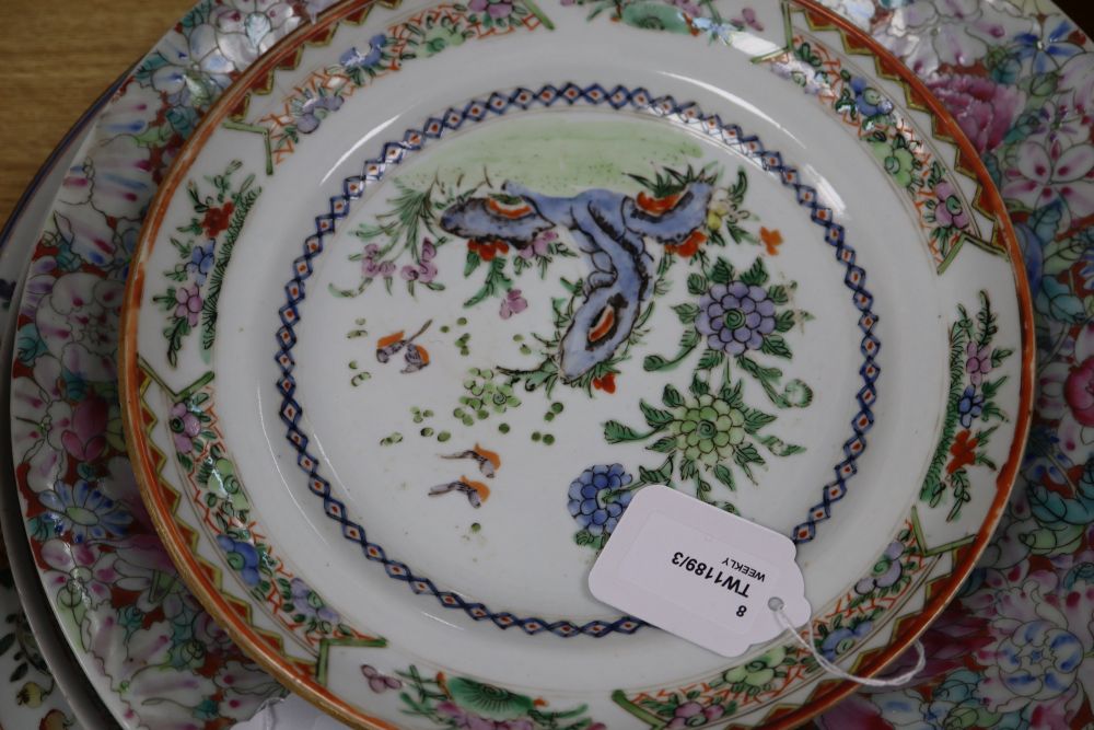 A collection of Oriental chargers and plates,